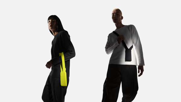 iPhone Pocket by ISSEY MIYAKE — short strap design in lemon and long strap design in black