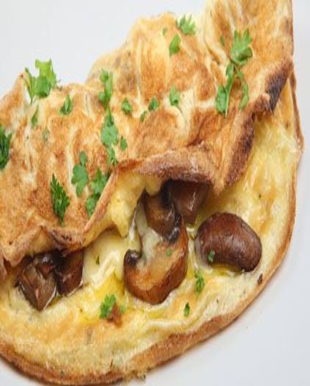 Omelette aux champignons et persil pour 5 personnes - Recettes Elle à Table