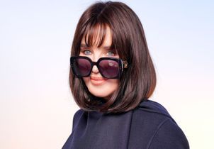 Avec son nouveau carré vintage, Isabelle Adjani illumine le front row du défilé Dior
