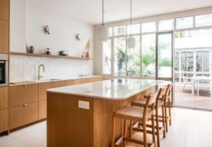 Une maison familiale aménagée autour d’un patio lumineux et accueillant