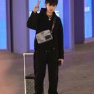 Kris Wu et son bagage Louis Vuitton