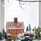 Noël : on décore avec une maison en biscuits et de la fausse neige 