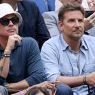 Brad Pitt et Bradley Cooper lors de la finale de l'US Open